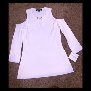 White open shoulder shirt